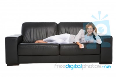 Teenage Girl Holding Tv Remote Stock Photo