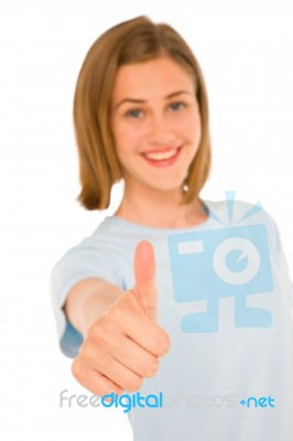 Teenage Girl Showing Thumbs Up Stock Photo