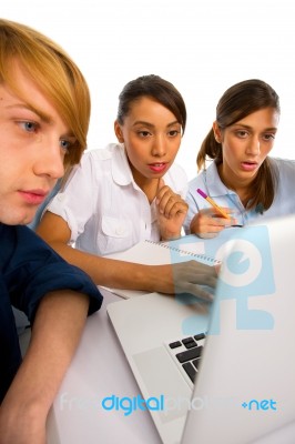 Teenage Students Using Laptop Stock Photo