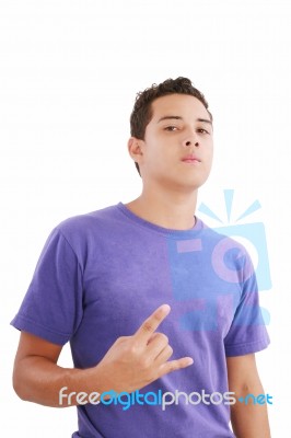 Teenager With Rock Gesture Stock Photo