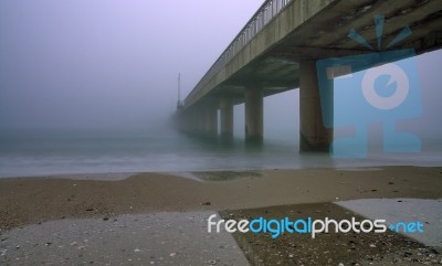The Bridge In The Fog Stock Photo