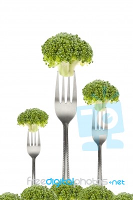 Three Broccoli On Forks Stock Photo
