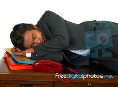 Tired Businessman Sleeping Stock Photo