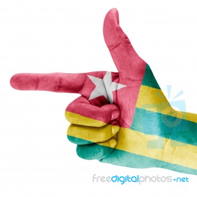 Togo Flag On Shooting Hand Stock Photo