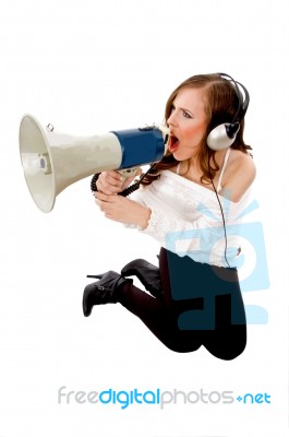 Top View Of Female Enjoying Music And Holding Loudspeaker Stock Photo