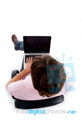 Top View Of Man Working On Laptop Stock Photo