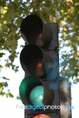 Traffic Lights On Green Stock Photo
