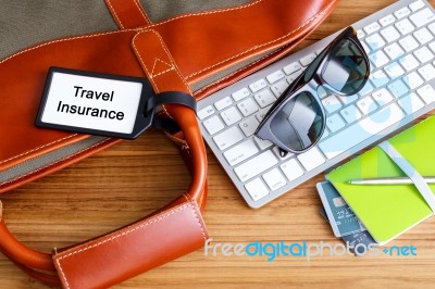 Travel Planning With Travel Insurance Tag Stock Photo