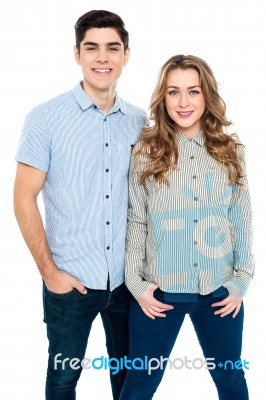 Trendy Young Couple Posing In Style Stock Photo