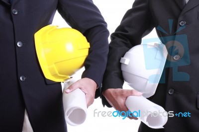 Two Engineer Hold Planing Project Paper Stock Photo