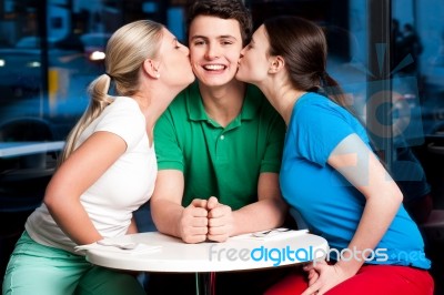 Two Girls Kissing Handsome Young Boy Stock Photo