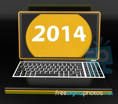 Two Thousand And Fourteen On Laptop Shows New Year Resolution 20… Stock Image