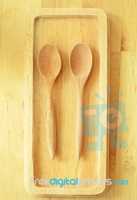 Two Wooden Spoons On Tray Stock Photo