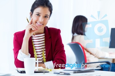 Two Young Businesswomen Working In Her Office Stock Photo