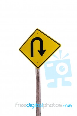 U-turn Symbol Road In Rustic City Isolated Stock Photo