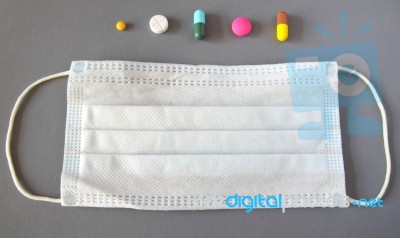 Various Medical Pills And Mask Stock Photo