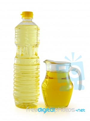 Vegetable Oil In A Plastic Bottle And Jar On White Background Stock Photo