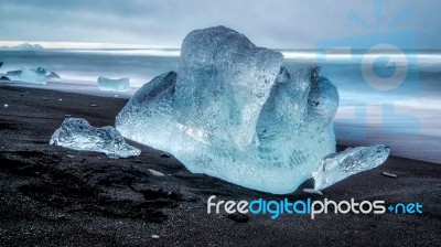 View Of An Iceberg On Jokulsarlon Beach Stock Photo