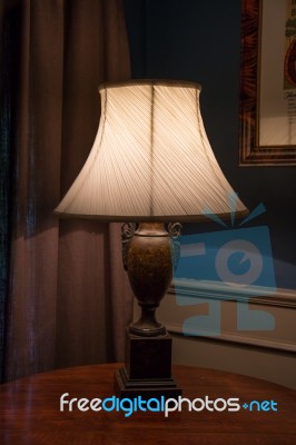 Vintage Desk Lamp On The Table Stock Photo