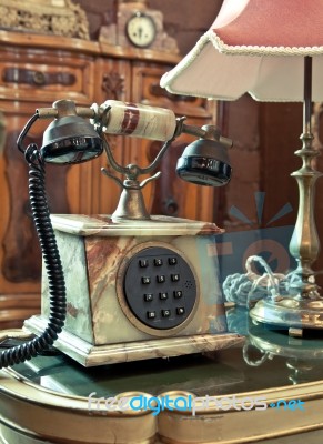 Vintage Telephone On The Table Stock Photo