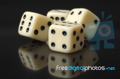 White Dice On A Black Background  Stock Photo