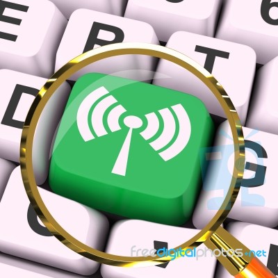 Wifi Key Magnified Shows Wireless Internet Access Transmitter Stock Image
