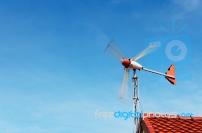 Wind Power Generator On House Stock Photo
