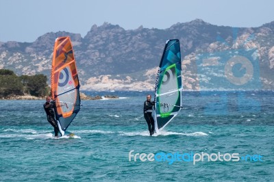 Windsurfing At Porto Pollo In Sardinia Stock Photo