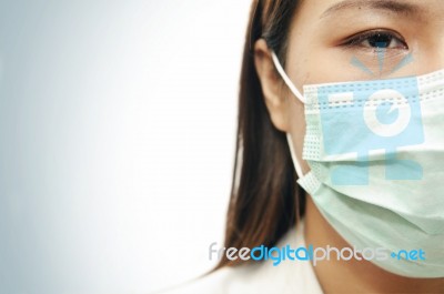 Woman Doctor Wearing Mask Stock Photo