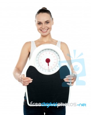 Woman Holding Weighing Scales Stock Photo