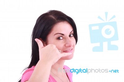 Woman Making A Call Me Gesture Stock Photo