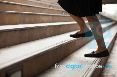 Woman Moving Up Steps Stock Photo Woman Moving Up Steps Stock Photo