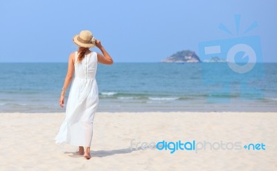 Woman On Beach Stock Photo