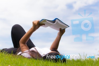 Woman Reading A Book Stock Photo