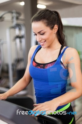 Woman Running On Treadmill Stock Photo
