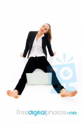 Woman Sat With Laptop Stock Photo