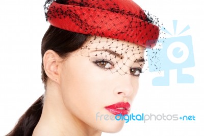 Woman With Red Hat Stock Photo