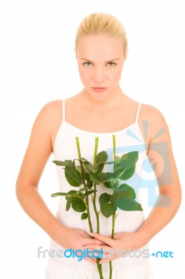 Woman With Rose Stems Stock Photo