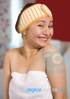 Woman Wrapped In A Bath Towel Stock Photo