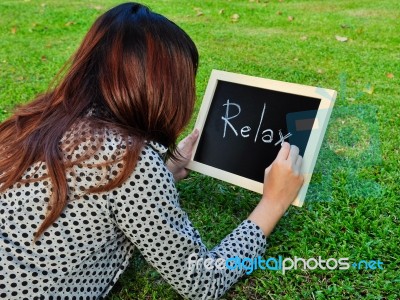 Woman Write Relax Word Stock Photo