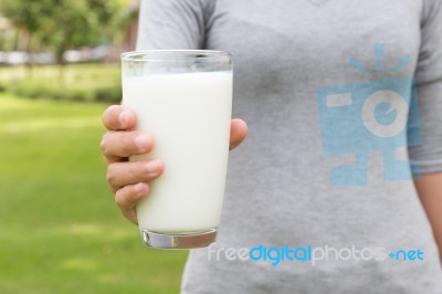 Women Hand Hold Milk In Glass Healthy Drink Lifestyle Stock Photo