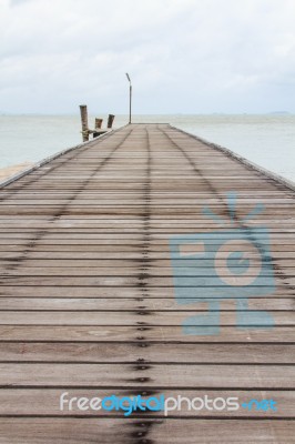 Wood Bridge On The Sea Stock Photo