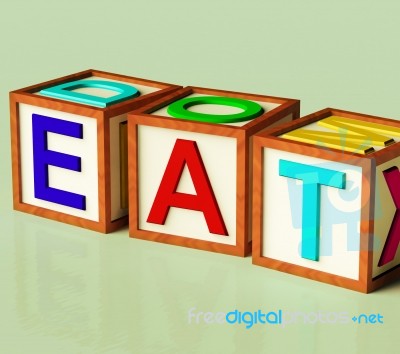Wooden Block With Eat Text Stock Image