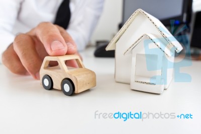 Wooden Car And Home On A Table Stock Photo