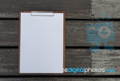 Wooden Paper Clipboard On Wood Background Stock Photo