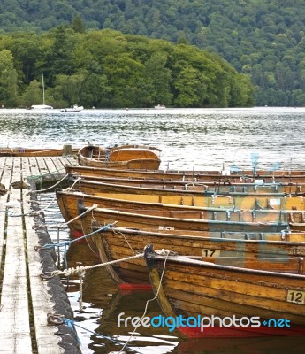 Wooden Rowing Boats Tied Stock Photo