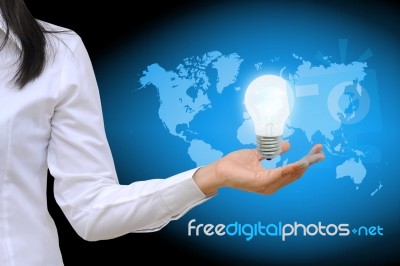 Working Women Hand Holding Light Bulb Stock Photo