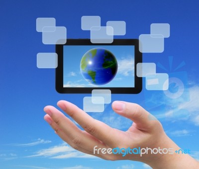 World In Touch Pad PC Stock Photo