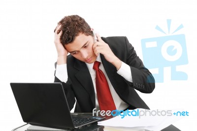 Worried Businessman On Phone Stock Photo