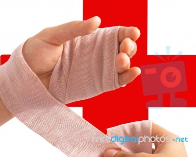 Wrapping Bandage Around Hand Stock Photo